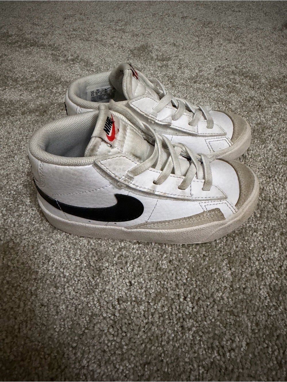 Nike Kids White and Black Mid-Top Sneakers with Red Logo